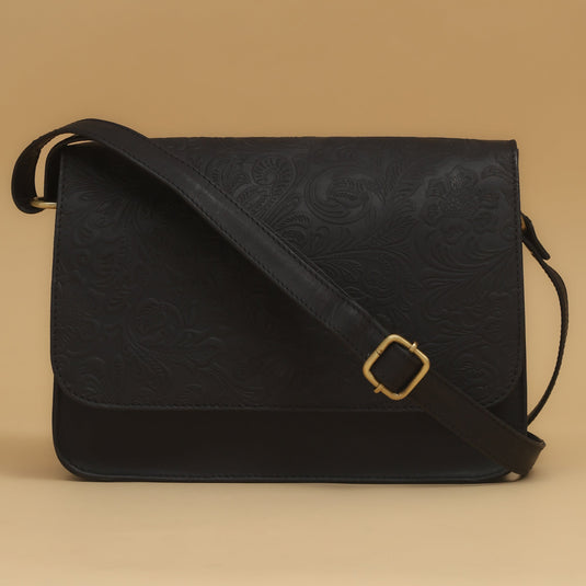 Eco-leather black embossed shoulder bag with adjustable strap and intricate floral design