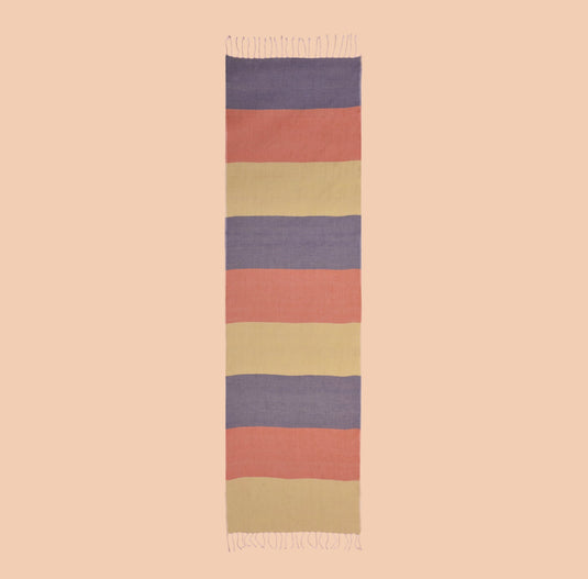 Organic cotton stole with bold horizontal coral, olive green, and navy color blocks, lightweight and breathable.