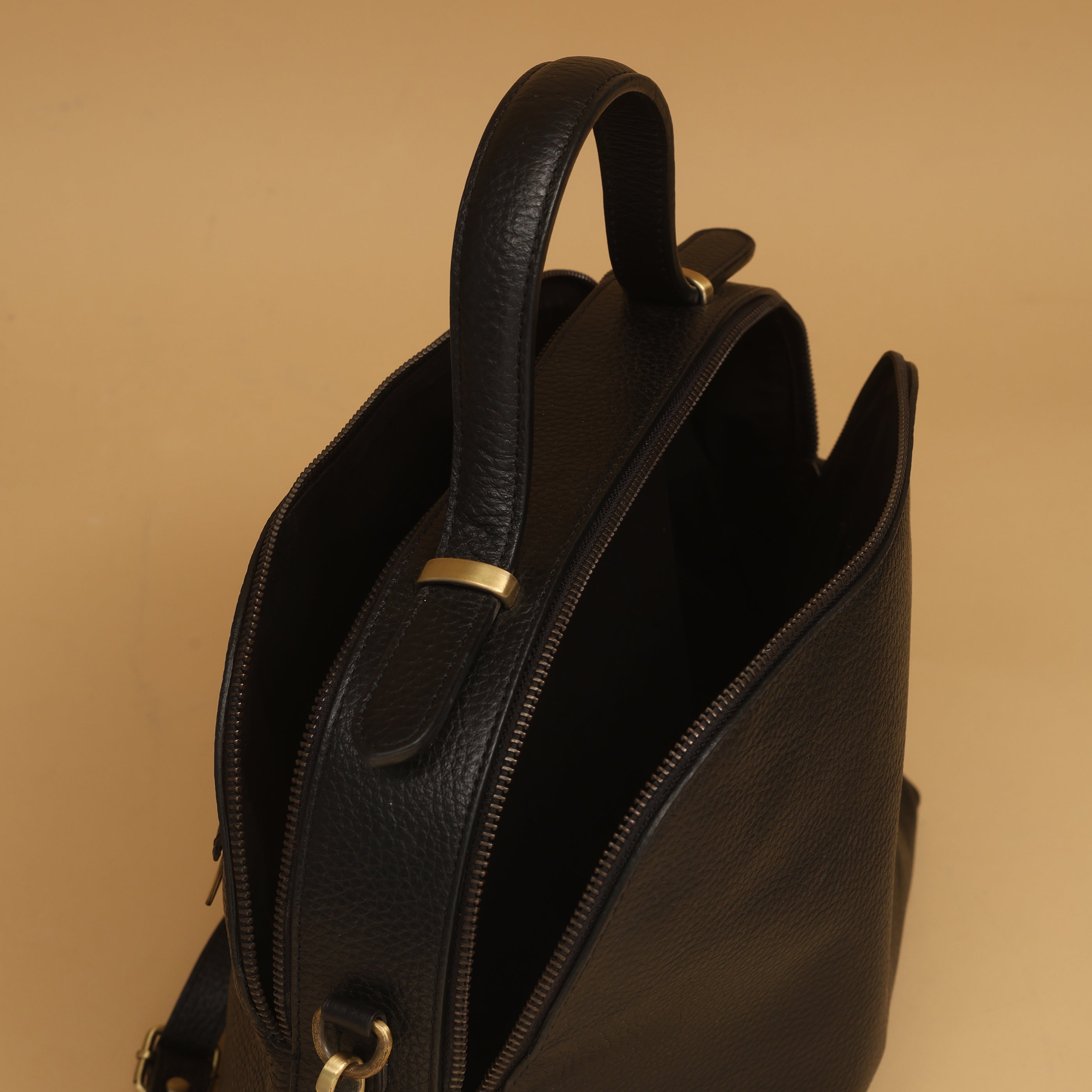 black leather backpack gold cross Cross Body Bag