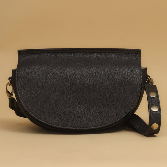 Black half-moon eco-leather shoulder bag with adjustable strap and minimalist design