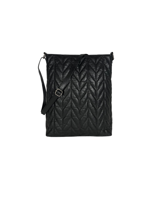 Handmade women's quilted shoulder bag in black.