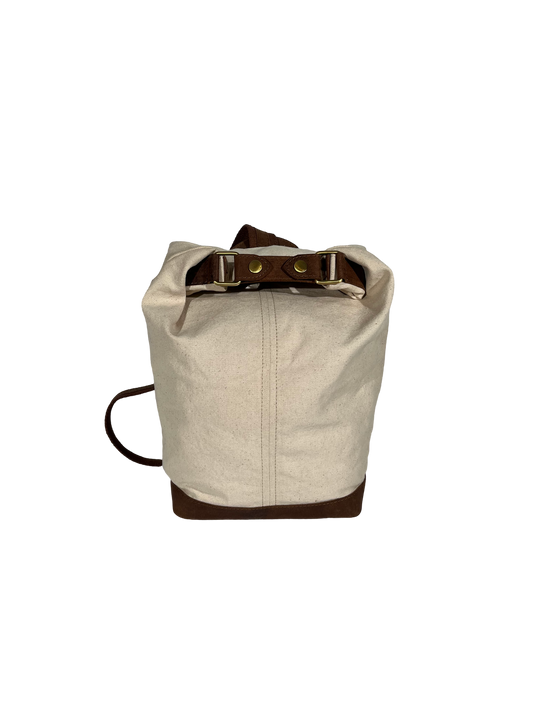 Handmade canvas backpack with leather accents.
