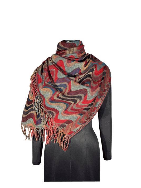 Woolen stole made of 100% merino wool with wave-inspired jacquard design, reversible.